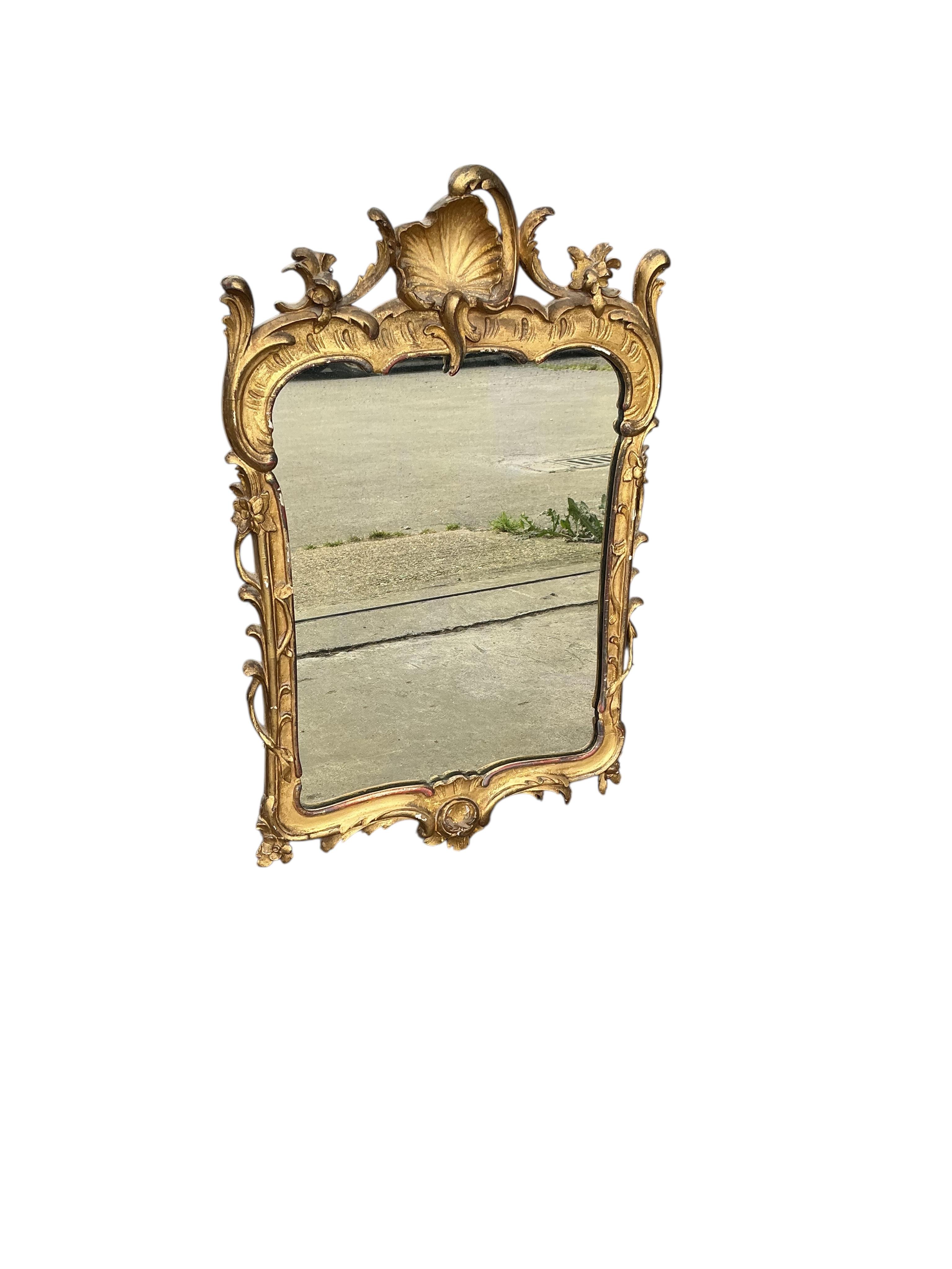 A Victorian giltwood and composition wall mirror, width 43cm, height 66cm